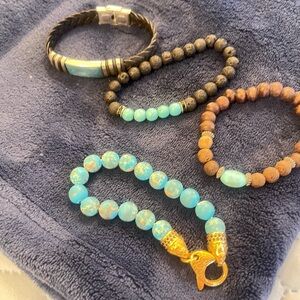 Four torques beaded and leather bracelet for one price all size 8. Ty